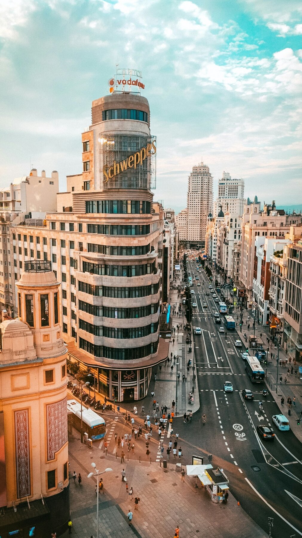 Gran Vía and central Madrid seen from above with pedestrians below