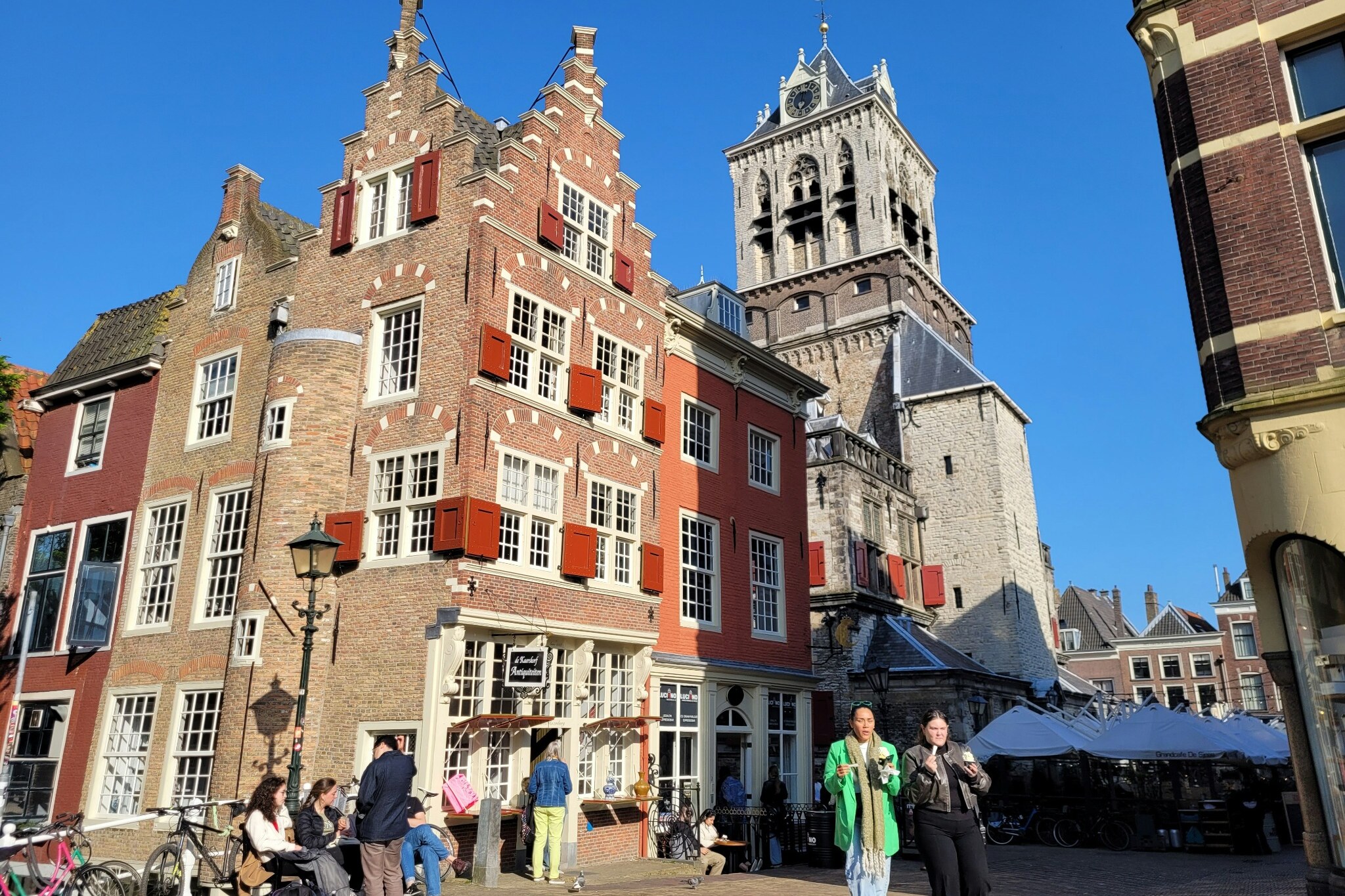 Historic stepped-gable buildings and church tower in Delft