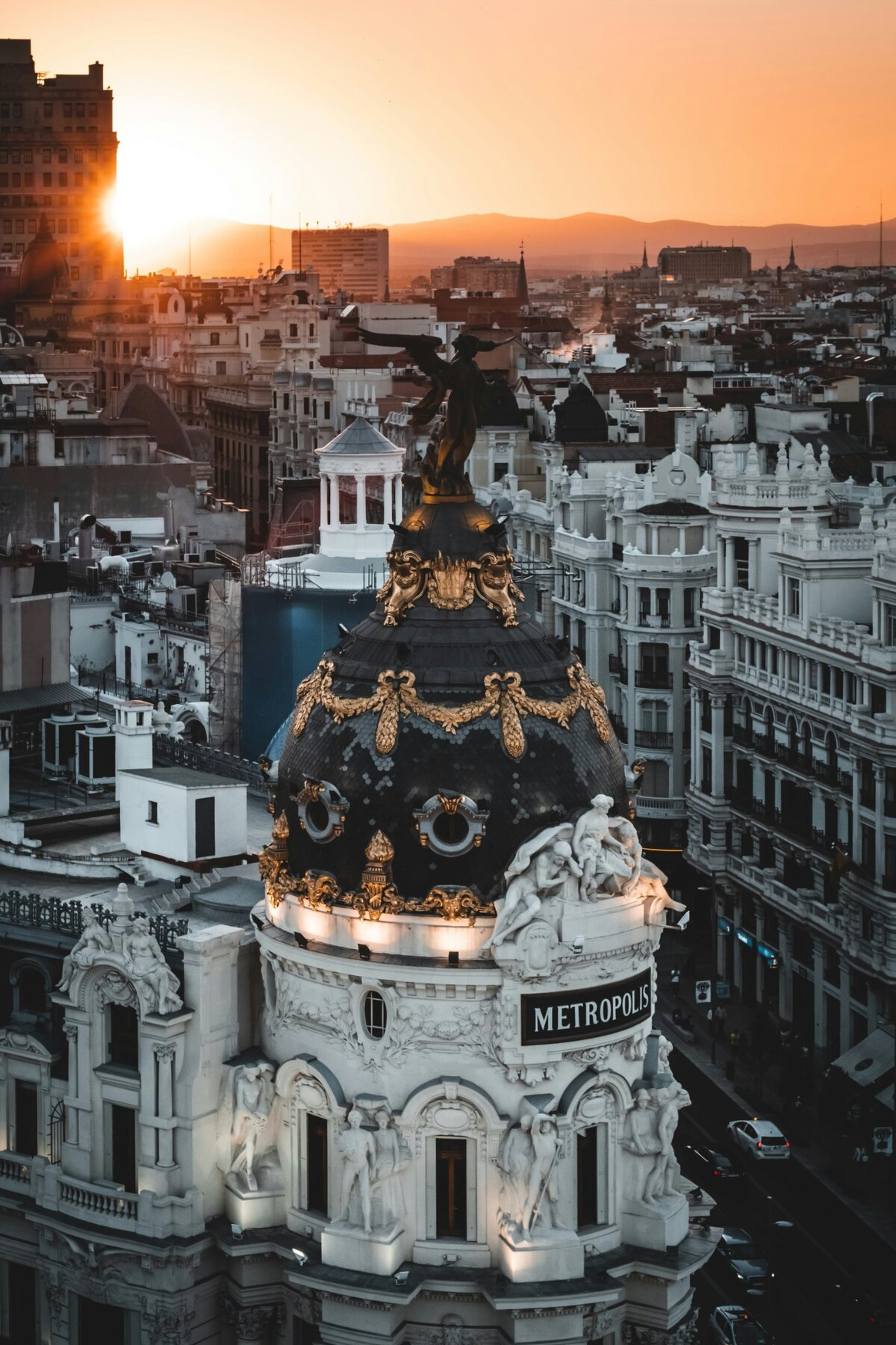 The Metropolis Building and Madrid rooftops at sunset