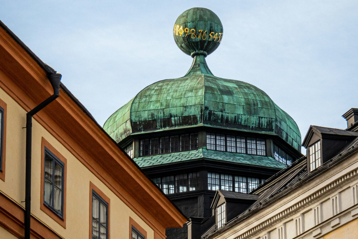 Historic architectural detail and a copper dome in Uppsala