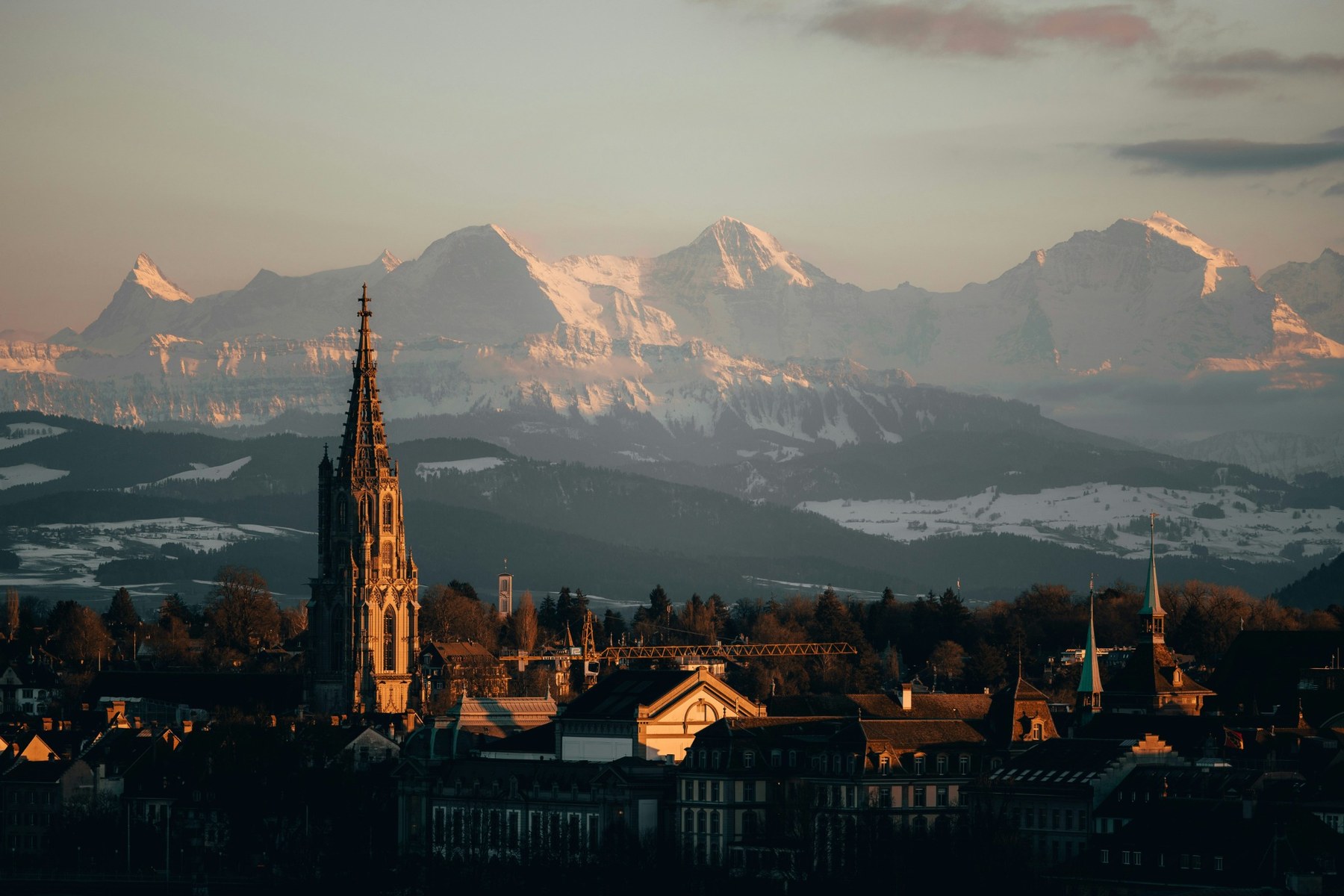 Bern's skyline with the Alps rising in the distance.